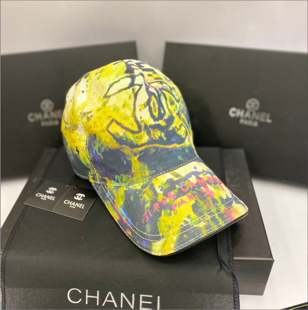 CHANEL YELLOW CAP